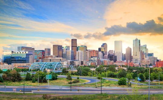 the denver skyline before dusk